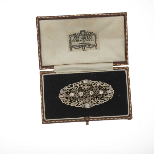 17 - A late 19th century old and rose-cut diamond openwork brooch, estimated total old-cut diamond weight... 