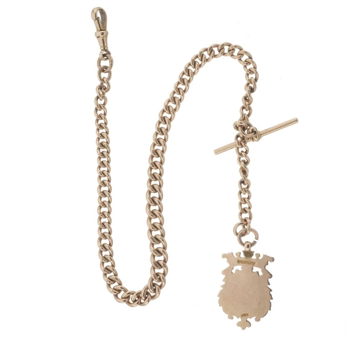 29 - An Edwardian 9ct gold Albert chain, with T-bar and lobster clasp terminal, suspending a 9ct gold shi... 