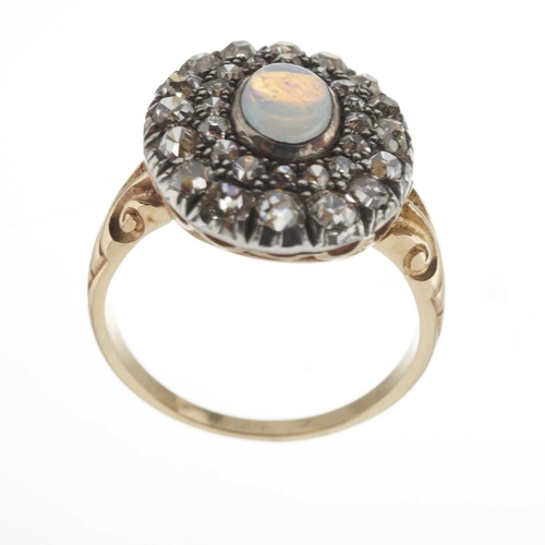 30 - An early 20th century gold and silver, opal cabochon and old-cut diamond cluster ring, opal estimate... 
