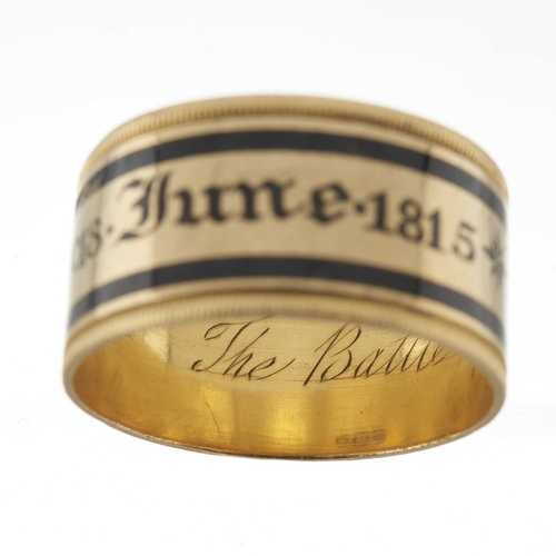 42 - An important George III 22ct gold Waterloo-related mourning band ring, with black enamel dedication ... 