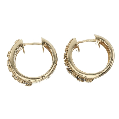 49 - A pair of 14ct gold sapphire and diamond hoop earrings, estimated total diamond weight 0.90ct, H-I c... 