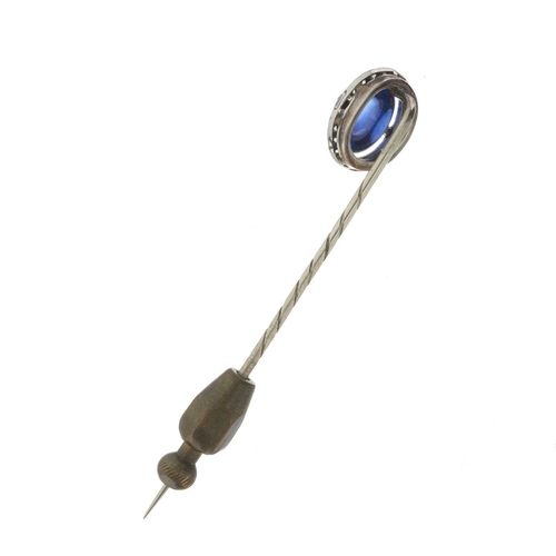 5 - A late 19th century sapphire cabochon and old-cut diamond cluster stickpin, sapphire estimated weigh... 