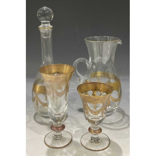 77 - A collection of Arte Italica 'Medici' flutes H: 19.5cm and wine glasses H: 14.5cm decorated in gilt ... 