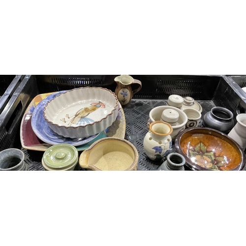 91 - A selection of studio pottery vessels to include a set of oriental stoneware bowls with makers mark,... 
