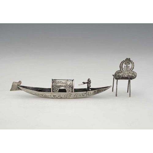 77 - A Continental silver novelty miniature gondola, the underside marked '930', length 14cm, together wi... 