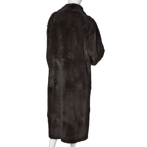 534 - Max, a full-length sheared coney coat, with a notched lapel collar, front button fastenings and two ... 