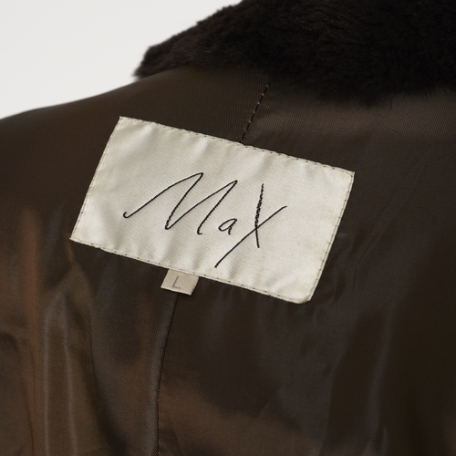 534 - Max, a full-length sheared coney coat, with a notched lapel collar, front button fastenings and two ... 