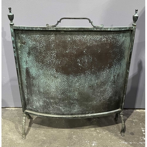 30 - A wrought metal companion set, bronzed finish, consisting of tongs, shovel, brush and poker, decorat... 