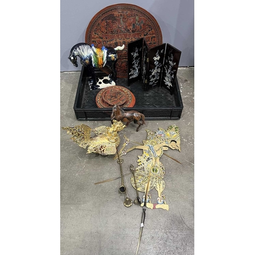 37 - A suite of Oriental placemats, coasters and a larger mat, possibly Balinese, red lacquered, black an... 