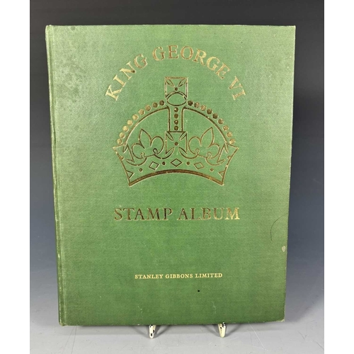 377 - Two Stanley Gibbons Stamp albums to include: 'The King George V1 Stamp Album' to include some stamps... 