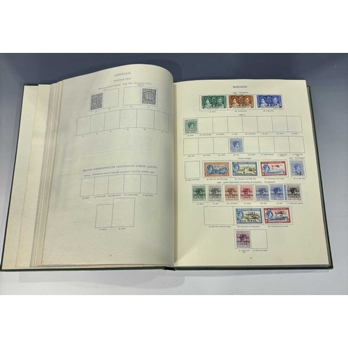377 - Two Stanley Gibbons Stamp albums to include: 'The King George V1 Stamp Album' to include some stamps... 