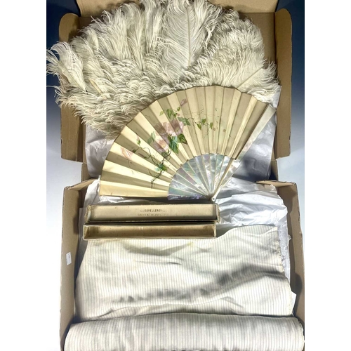 381 - An Edwardian mother of pearl and silk, painted pink convolvuus flowers and signed C Leroy in a box m... 