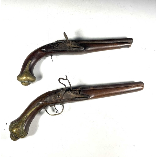 382 - Two antique flintlock horse pistols, walnut stocks, brass pommels, 36cm long (2)