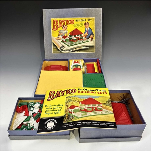 384 - Three boxes of Bayko, 1950's, including Building Set No.1, Converting Sets No.0X and 1X, with instru... 
