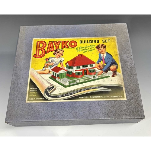 384 - Three boxes of Bayko, 1950's, including Building Set No.1, Converting Sets No.0X and 1X, with instru... 