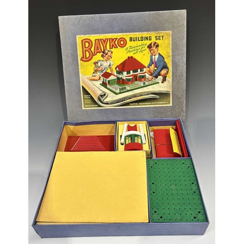 384 - Three boxes of Bayko, 1950's, including Building Set No.1, Converting Sets No.0X and 1X, with instru... 