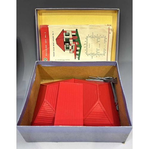 384 - Three boxes of Bayko, 1950's, including Building Set No.1, Converting Sets No.0X and 1X, with instru... 