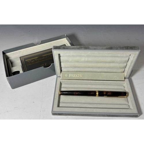 391A - A cased vintage Parker 'Premier Collection' fountain pen, 'Chinese Laque', with an 18ct gold nib, in... 