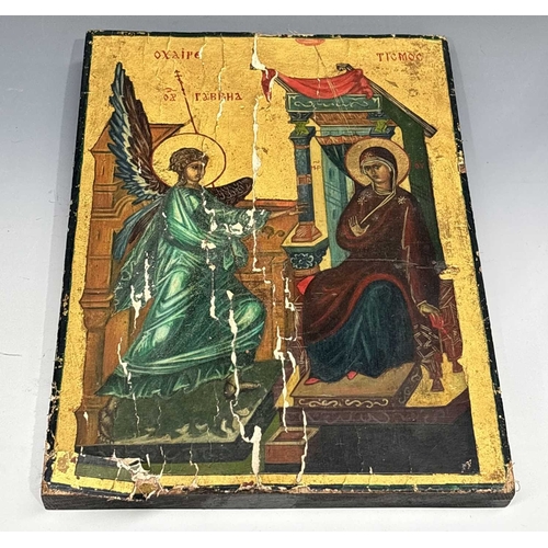 401 - A Greek Orthodox icon of the Annunciation, polychrome painted and gilded on gesso and wood panel, 30... 
