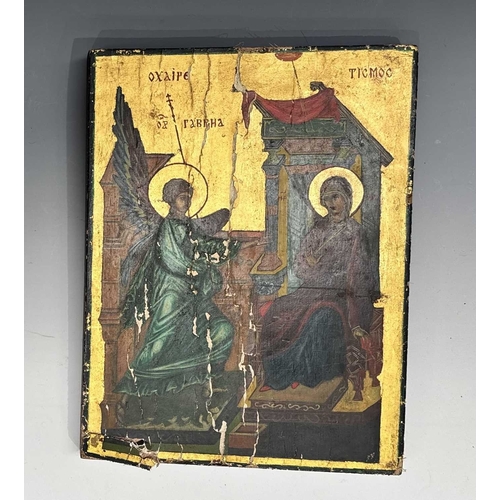 401 - A Greek Orthodox icon of the Annunciation, polychrome painted and gilded on gesso and wood panel, 30... 