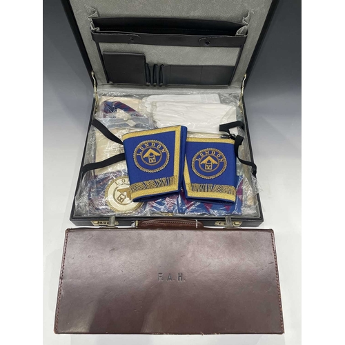 408 - A collection of British and French Masonic memorabilia and regalia, contained in a leather briefcase... 