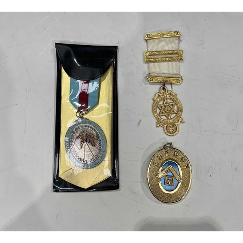 408 - A collection of British and French Masonic memorabilia and regalia, contained in a leather briefcase... 