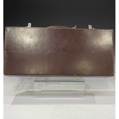 408 - A collection of British and French Masonic memorabilia and regalia, contained in a leather briefcase... 