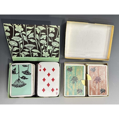 410 - A collection of playing cards, most unused, Thomas de la Rue 'Pierrot' cased set with sample card, b... 