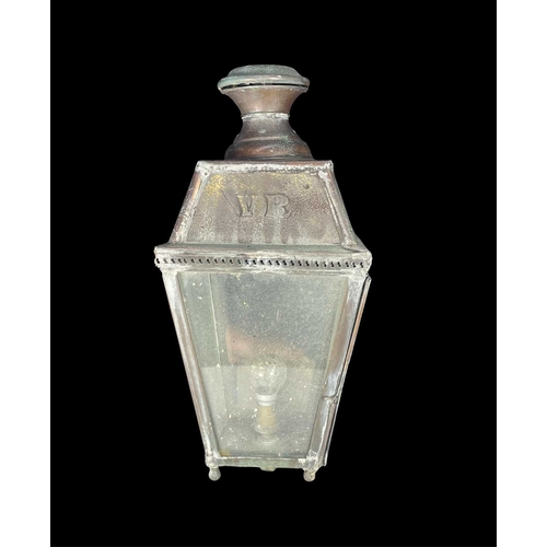 417 - A Victorian style copper, brass and glass lantern, scrolled wall fixing bracket, top panels stamped ... 