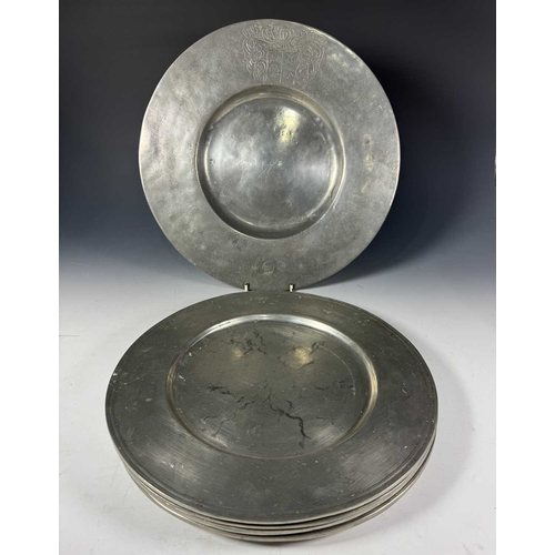 421 - A set of six heavy tin dinner plates, some with control marks, diameter 32cm, together with a larger... 