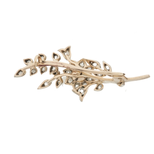10 - An early 20th century old and rose-cut diamond floral spray brooch, with pearl central highlight, es... 