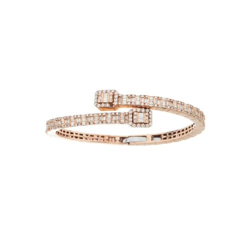 111 - A 9ct gold vari-cut diamond crossover hinged bangle bracelet, estimated total diamond weight 6.50ct,... 