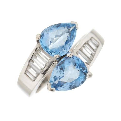 114 - An 18ct gold aquamarine and calibre-cut diamond crossover ring, estimated total aquamarine weight 3.... 