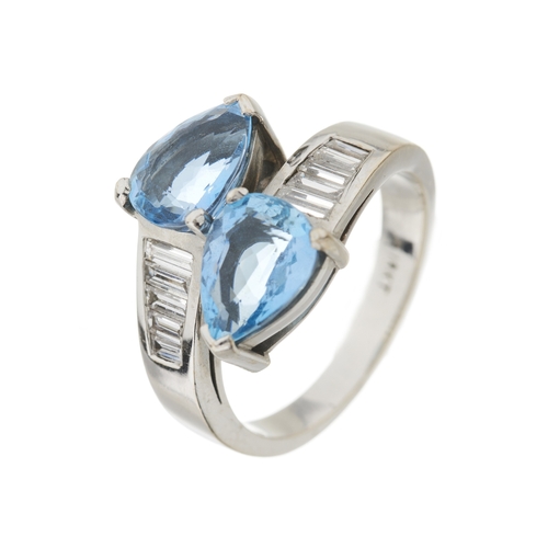 114 - An 18ct gold aquamarine and calibre-cut diamond crossover ring, estimated total aquamarine weight 3.... 