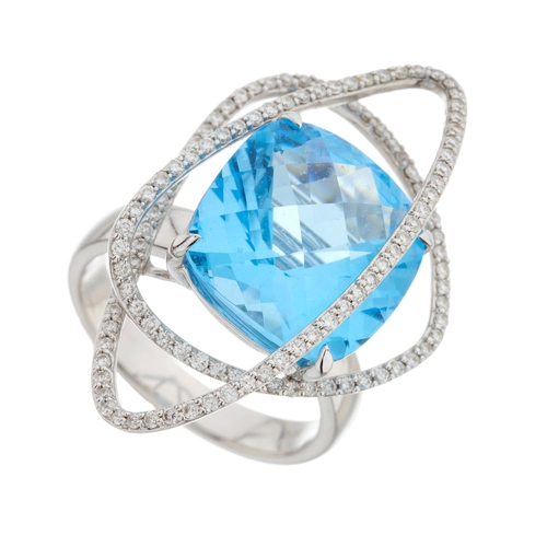 115 - An 18ct gold blue topaz and diamond cocktail ring, estimated total diamond weight 0.60ct, H-I colour... 