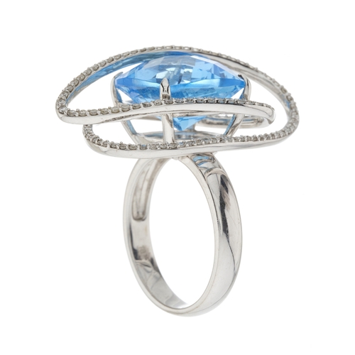 115 - An 18ct gold blue topaz and diamond cocktail ring, estimated total diamond weight 0.60ct, H-I colour... 