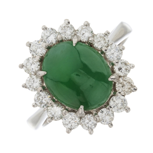 163 - An 18ct gold jade cabochon and brilliant-cut diamond cluster ring, jade measures approximately 10.4m... 