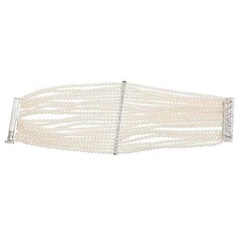 167 - An 18ct gold slightly graduated cultured pearl multi-row bracelet, with brilliant-cut diamond slidin... 