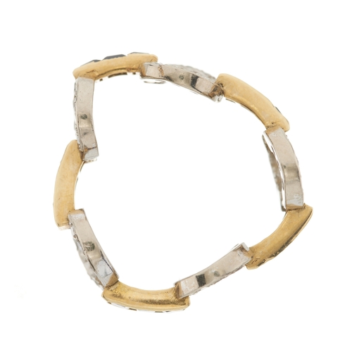 169 - A bi-metal calibre-cut synthetic sapphire and single-cut diamond full eternity flexible ring, estima... 