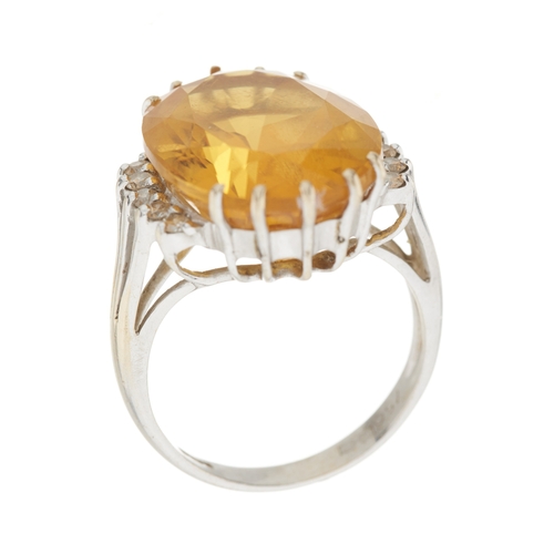 179 - An 18ct gold citrine and diamond cocktail ring, citrine estimated weight 12.80ct, estimated total di... 