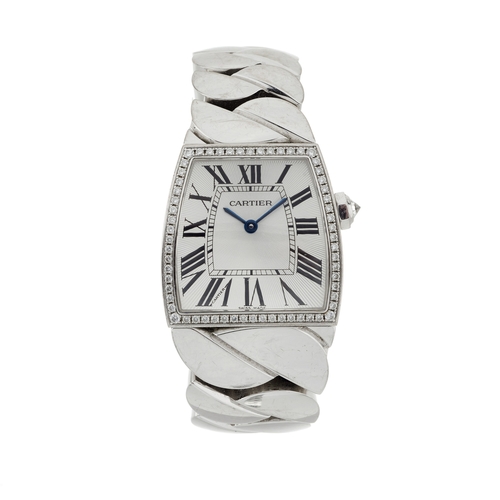 195 - 
Cartier 
A La Doña De Cartier bracelet watch
Case: Signed. 18ct gold. Common Control Mark. Referenc... 