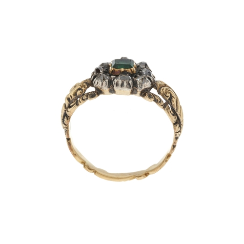 2 - A late Georgian emerald and old-cut diamond cluster ring, with scrolling shoulders and band, emerald... 