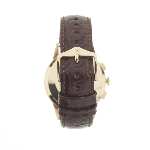 233 - 
Avia 
A chronograph wrist watch
Case: Unsigned. 9ct gold. Import hallmarks for London 1969. Numbere... 