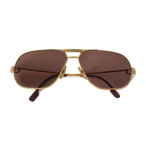 265 - Cartier, a pair of prescription Aviator sunglasses, with gold-plated metal frames and brown-tinted l... 