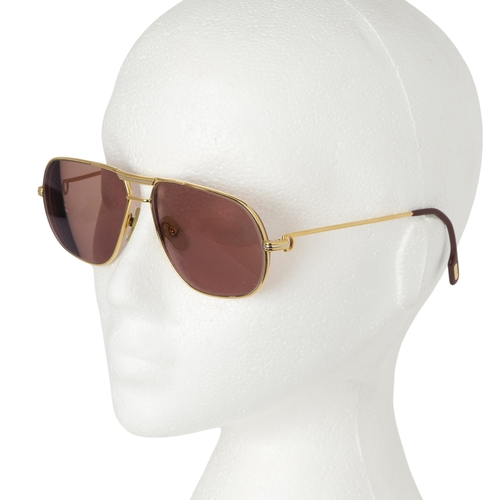 265 - Cartier, a pair of prescription Aviator sunglasses, with gold-plated metal frames and brown-tinted l... 