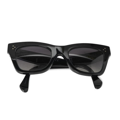 268 - Celine, a pair of Catherine sunglasses, designed with shiny black acetate cat eye frames and grey ti... 