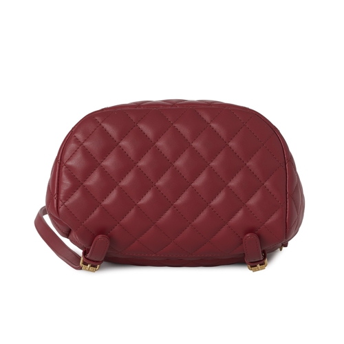 273 - Chanel, an Urban Spirit backpack, crafted from diamond quilted cherry red leather, with gold-tone ha... 