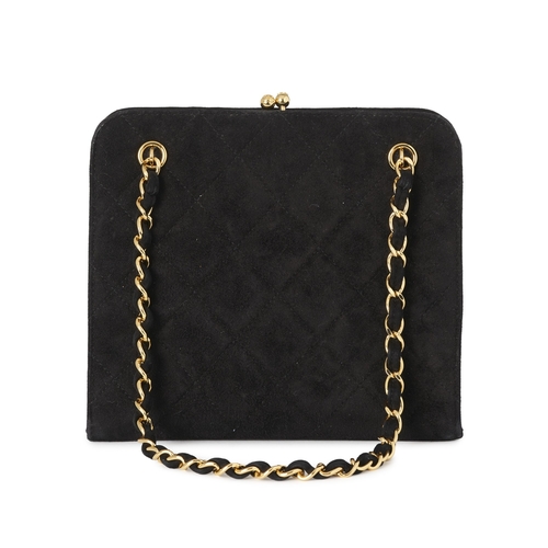274 - Chanel, a vintage kiss-lock handbag, crafted from quilted black suede, with 24k gold-plated hardware... 