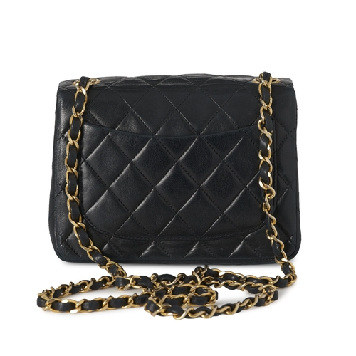 275 - Chanel, a vintage Mini Square Classic Flap handbag, crafted from black lambskin leather, with diamon... 