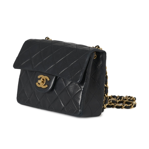 275 - Chanel, a vintage Mini Square Classic Flap handbag, crafted from black lambskin leather, with diamon... 
